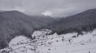 Winter aerial view of rural mountain landscape near Bran, in Transylvania, Romania