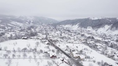 Winter aerial view of rural mountain landscape near Bran, in Transylvania, Romania