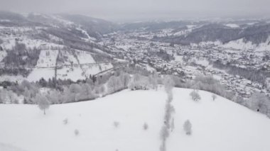 Winter aerial view of rural mountain landscape near Bran, in Transylvania, Romania