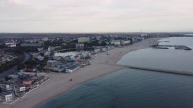 Aerial footage of Romanian travel destination at the Black Sea shore, town Eforie