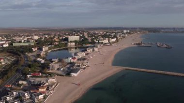 Aerial footage of Romanian travel destination at the Black Sea shore, town Eforie
