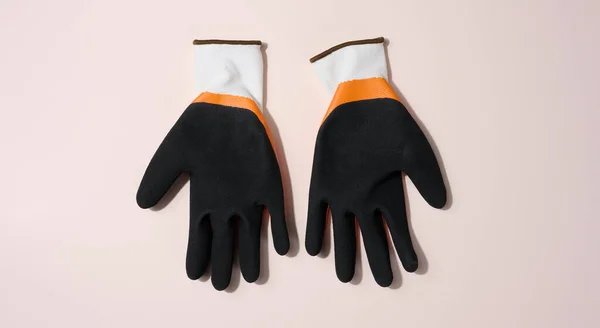 Knitted gloves with latex coating to protect against mechanical damage, grease and oil