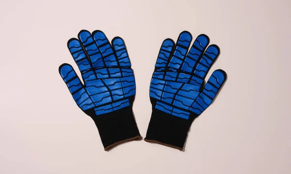 Knitted gloves with embossed latex coating to protect against mechanical damage and cuts. Have good surface adhesion