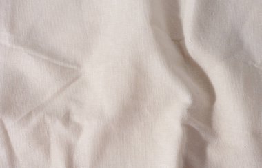 Beyaz çarşaf, giysi kumaşı. Tam çerçeve