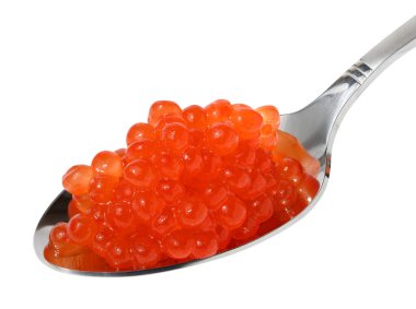 Red sturgeon caviar in a metal spoon on a white isolated background, delicious snack
