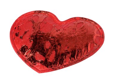 Red textile decorative heart on a white background, interior decoration, gift wrapping