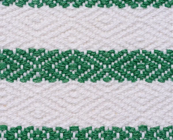 Кусок Хлопчатобумажной Ткани Изготовления Скатертей Кухонных Полотенец Зелеными Вышитыми Элементами — стоковое фото