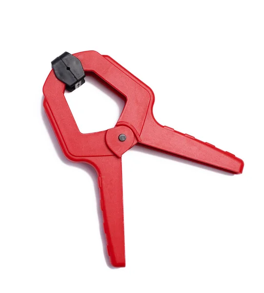 Large Red Plastic Clamp White Isolated Background Top View — Stock Photo, Image