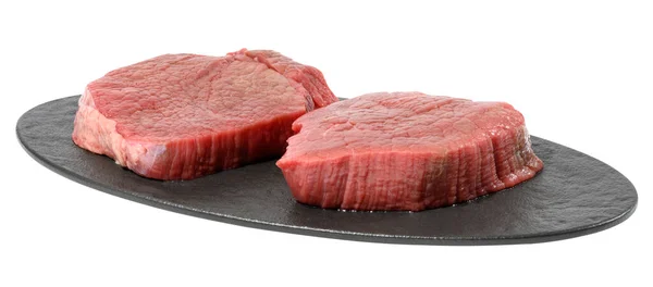 Dois Bifes Redondos Carne Crua Uma Placa Corte Oval Preta — Fotografia de Stock
