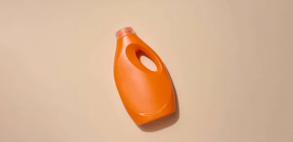 Μπουκαλάκι Πλαστικό Πορτοκαλί Για Υγρά Απορρυπαντικά Για Πλύσιμο Ρούχων Μπεζ — Φωτογραφία Αρχείου