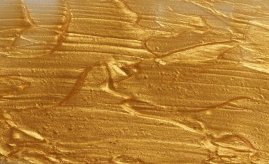 Küçük parçalı altın parıltılı jel örneği, fosforlu kalem dokusu, ruj, allık.