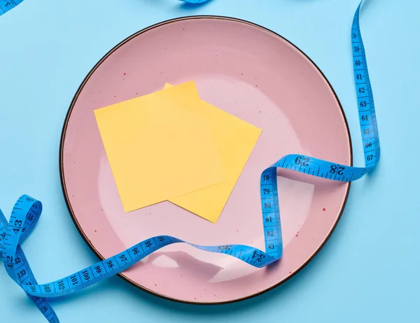 Pink Plate Centimeter Blue Background Weight Loss Concept — Stock Photo, Image