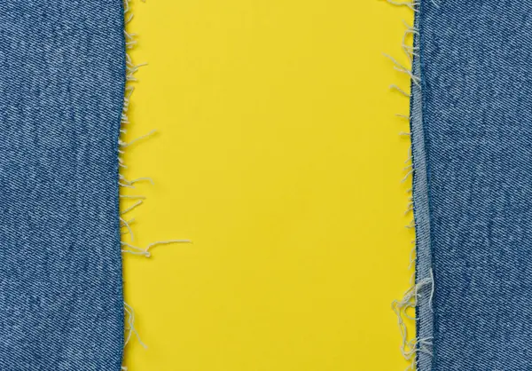 Torn Edges Blue Jeans Yellow Background — Stock Photo, Image
