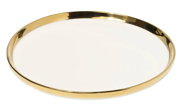 白い隔離された背景に金色の端が付いている空の円形の陶磁器の白い版 アングルでクロッカー — ストック写真