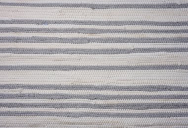 Örgü beyaz-gri kumaş parçası, yakın çekim.