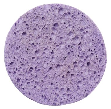 Round purple makeup sponge on a white isolated background, top view