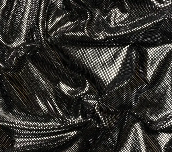 Black fabric with foil elements, wavy surface