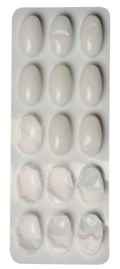 Beyaz plastik ambalajlı oval tabletler, üst görünüm