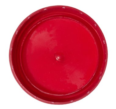 İzole arka planda kırmızı plastik şişe kapağı, üst görünüm