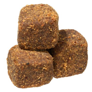 Esmer köpek maması ya da ziyafet, dokulu, parçalanmış bir yüzey, izole bir arka plan, yığınla