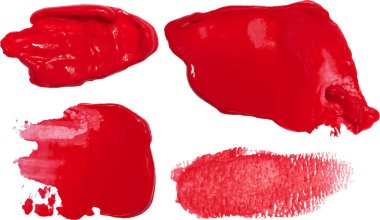 İzole bir zemin üzerinde çeşitli şekil ve dokulardan oluşan parlak kırmızı renkli birkaç nokta ve leke.