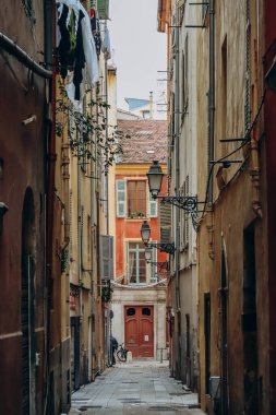 Nice, France - 20.12.2022 : Narrow and dark street in Old Nice in December