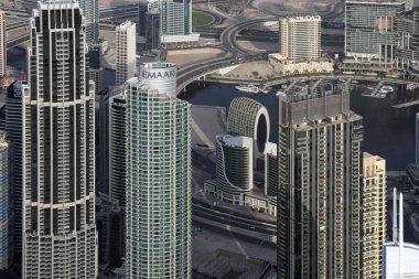 Dubai, United Arab Emirates - 01.05.2022 : View of skyscrapers in downtown Dubai from the highest building in the world - Burj Khalifa