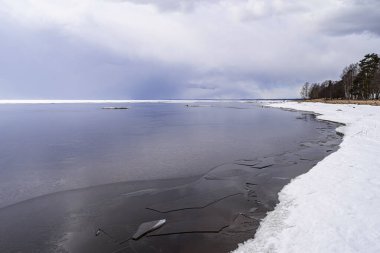 View of the Gulf of Finland in early spring, in the Leningrad region, near St. Petersburg