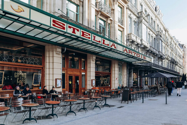 Brussels, Belgium - October 21, 2023: Beautiful vintage "Stella Artois" sign on a bar in the center of Brussels