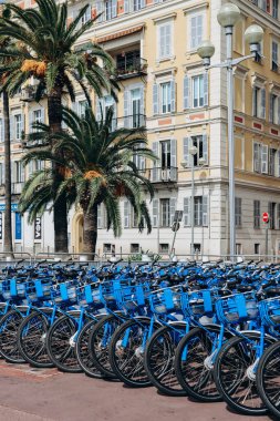 Nice, France - September 17, 2023: Blue bicycles for rent 