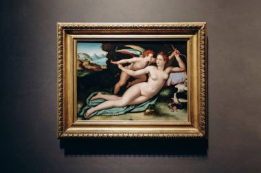Florence, İtalya - 29 Aralık 2023: Alessandro Allori 'nin Venüs Silahsız Aşk Tanrısı tablosu, 1570, Uffizi Galerisi