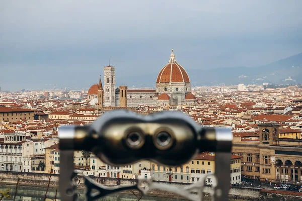 View of Florence from the observation deck, with binoculars