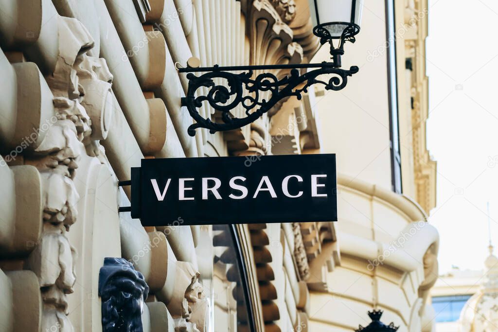 Monaco, Monaco - 20 January 2024 : Sign of the Versace boutique in the building of the famous Monte Carlo casino in Monaco