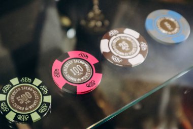 Monaco, Monaco - 2 September 2023: Game tokens at the Monte Carlo Casino in Monaco clipart