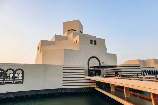stock image Doha, Qatar - 29 April 2024: The Museum of Islamic Art, designed by the renowned architect I.M. Pei, features geometric elegance and a stunning facade that beckon visitors to explore the captivating world of Islamic culture.
