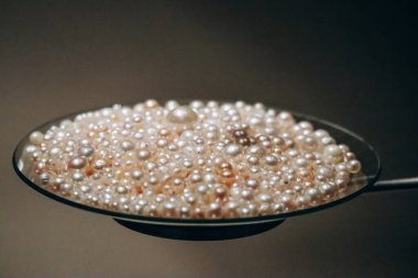 Real pearls found by pearl divers in Doha, the capital of Qatar, in the 19th and 20th centuries clipart