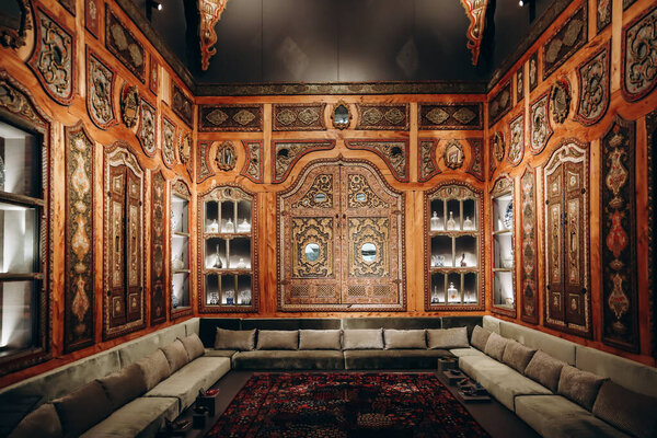 Doha, Qatar - 1 May 2024: Exploring the Museum of Islamic Art (MIA) and iranian rugs