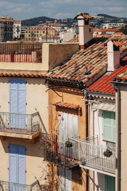 Cannes, France - August 1, 2024: View of the rooftops of Cannes on a sunny day clipart