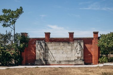 Budapest, Hungary - August 10, 2024: Soviet Heroic Memorial, artist Laszlo Peter, 1951. Memento Park clipart