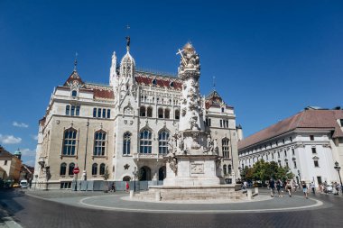 Budapest, Hungary - August 10, 2024: The former Ministry of the Treasury, a neo-Gothic building located in the 1st district of Budapest, Hungary. clipart