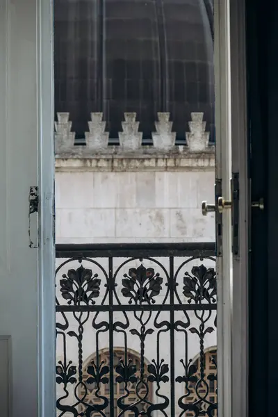 stock image Art Nouveau style wrought iron balcony railing and the Budapest Synagogue in the background.