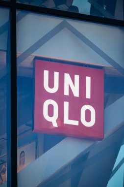 Nice, France - July 27th, 2024: Close-up of the Uniqlo sign in the center of Nice clipart