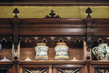 Bologna, Italy - October 6, 2024: Interior of an old pharmacy in the center of Bologna clipart