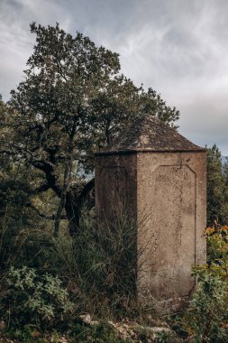 Surroundings of the Saint-Andre chapel in Orris de la Roquebrussanne clipart