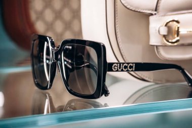 Cannes, France - 10 November 2024: Close-up of Gucci glasses in a boutique window on the Croisette promenade in Cannes clipart