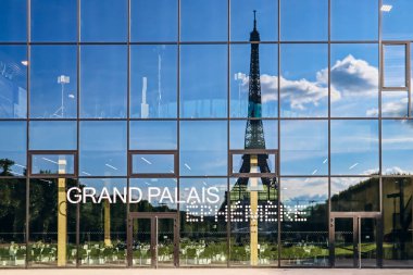 Paris, France - July 15, 2021: Grand Palais Ephemere in front of the Eiffel tower clipart