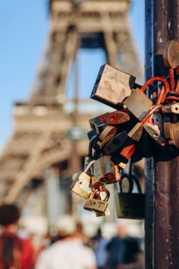 Paris, France - 15 July 2021: Padlocks left by tourists near the Eiffel Tower in Paris clipart