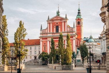 Ljubljana, Slovenia - 14 August 2024: Preseren Square, the central square in Ljubljana. It is part of the old town pedestrian zone and a major meeting point clipart