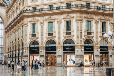 Milan, Italy - August 20, 2024: Prada storefront in Galleria Vittorio Emanuele II in Milan clipart