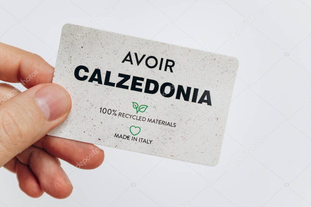 Paris, France - 23 February 2025: Calzedonia gift card in hand, eco recycled materials